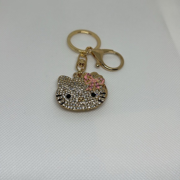 Gold and Pink Hello Kitty Keychain with a mini mirror - Picture 3 of 3